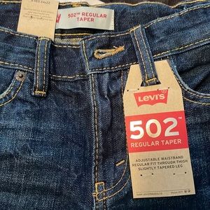 Kids Levi 502 Regular Taper with Shredded front. New. Never work